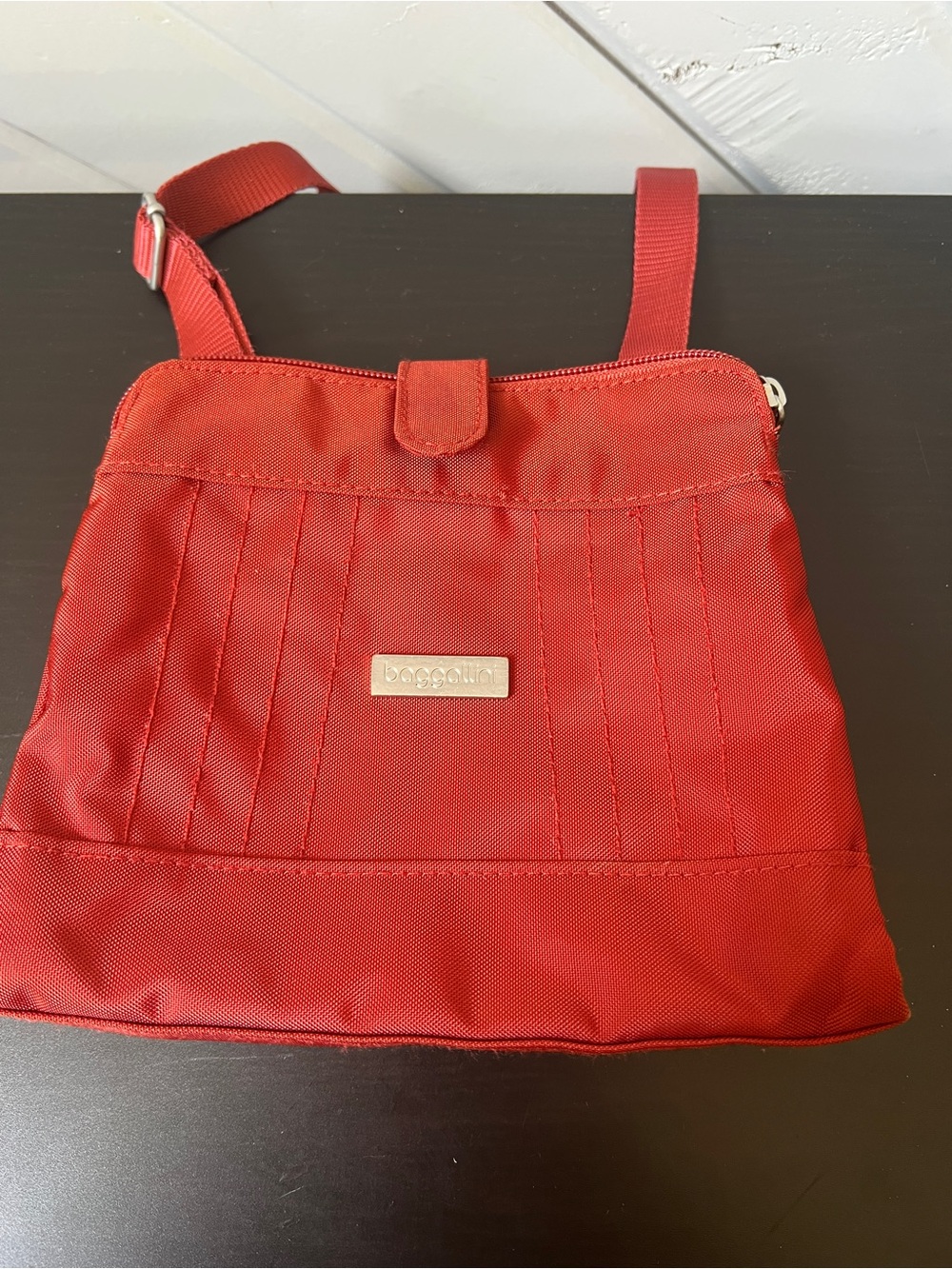 Baggallini Burnt Orange Nylon Crossbody with Gold Logo Plate